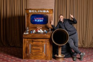 Director Isaac Kasende with the Belinda “Living Flesh” arcade prop